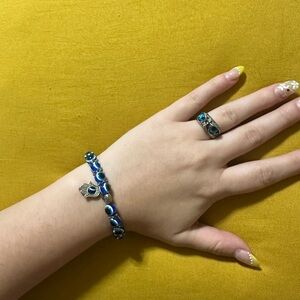 Evil eye bracelet, and owl ring